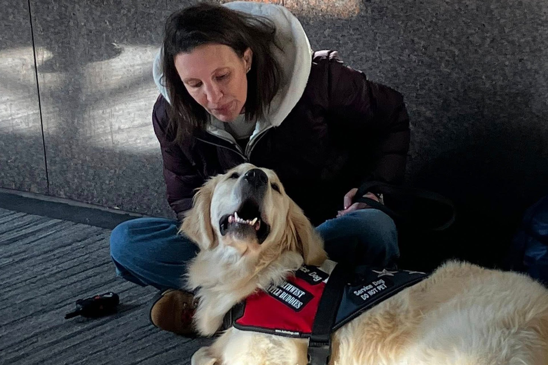A female Veteran and her service dog